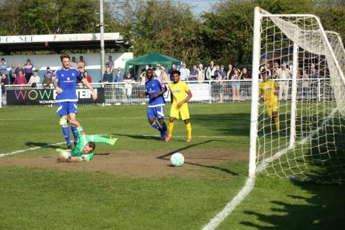 Billericay keeper Alan Julian can only watch as Billy Crooks shot finds the net for the final Enfield goal