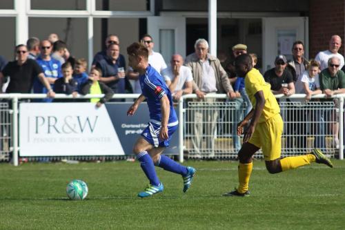 Billericays Byron Lawrence (L) and Enfields Percy Kiangebeni