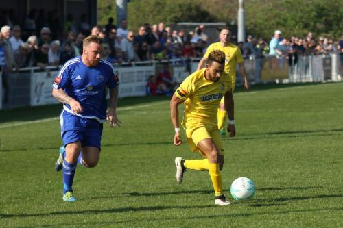 Billericays Jamie OHara (L) chases Tyler Campbell