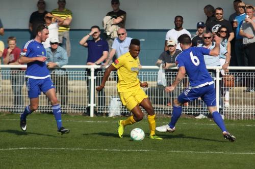 Billericays Joe Ellul (6) challenges Karl Oliyide