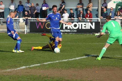 Billericays Joe Ellul (blue, R) dispossesses Dernell Wynter