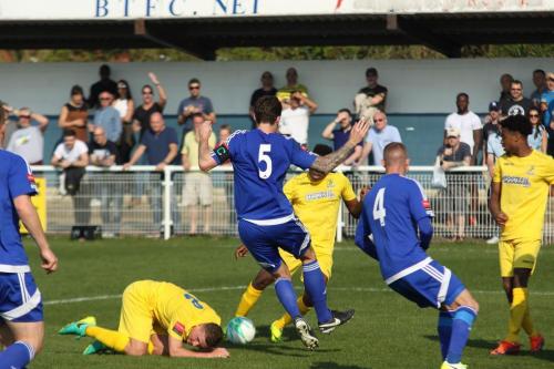 Billericays Rob Swaine (5) tries to block Karl Oliyides shot