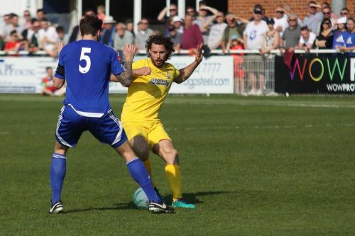 Billericays Rob Swaine (L) challenges Harry Ottaway