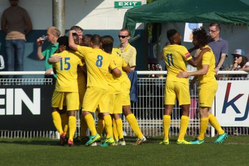 Enfield celebrate their second goal, scored by Harry Ottaway (R