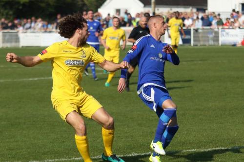 Enfields Harry Ottaway (L) and Billericays Paul Konchesky