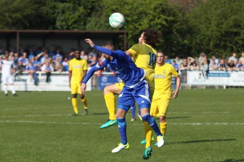 Enfields Harry Ottaway challenges Paul Konchesky (blue)