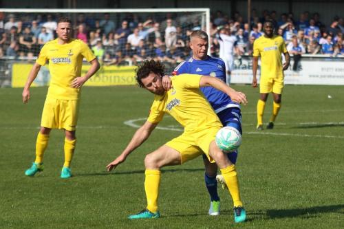 Enfields Harry Ottaway challenges Paul Konchesky (blue)73