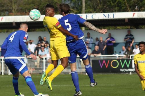Enfields Karl Oliyide challenged by Rob Swaine (5) and Paul Konchesky