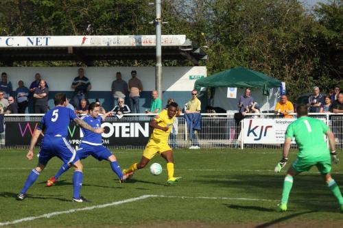 Enfields Karl Oliyide crosses  Rob Swaines (5) clearance flew narrowly over the bar