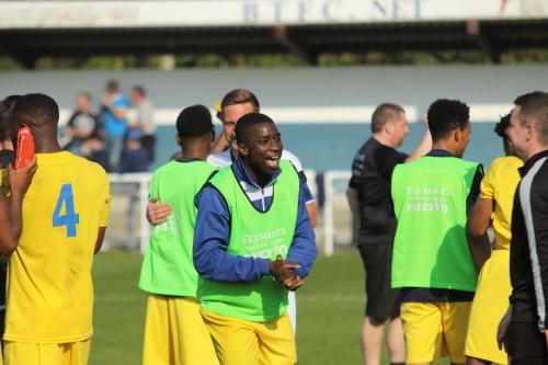 Enfields Percy Kiangebeni (green bib, centre)