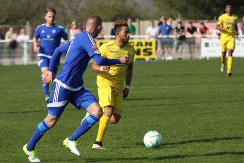 Enfields Tyler Campbell (R) and Billericays Paul Konchesky