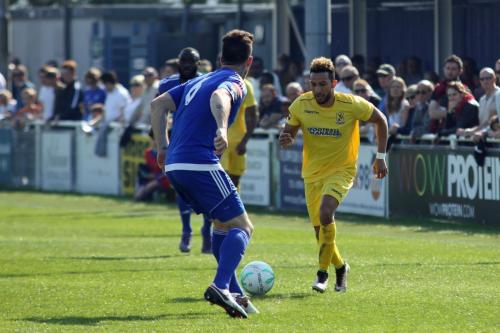 Enfields Tyler Campbell (R) runs at Joe Ellul