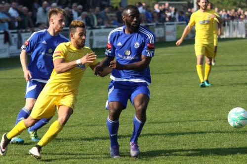 Enfields Tyler Campbell and Billericays Byron Lawrence (L) and Tambeson Eyong
