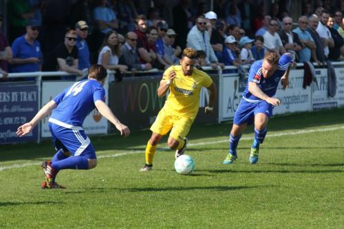 Enfields Tyler Campbell and Billericays Lewis Taafe (L) and Jamie OHara
