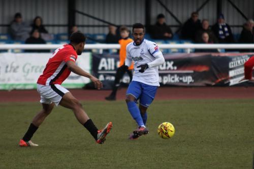 Burgess Hills Cheick Toure (L) and Enfields Bobby Devyne