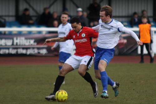 Burgess Hills Leon Redwood (L) holds off Mickey Parcell