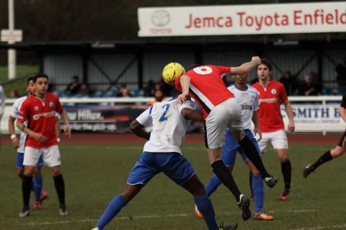 Burgess Hills Sam Fisk (red) heads clear from Harold Joseph