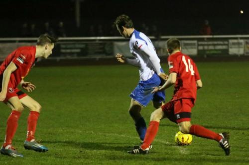 Enfields Mickey Parcell runs at the defence