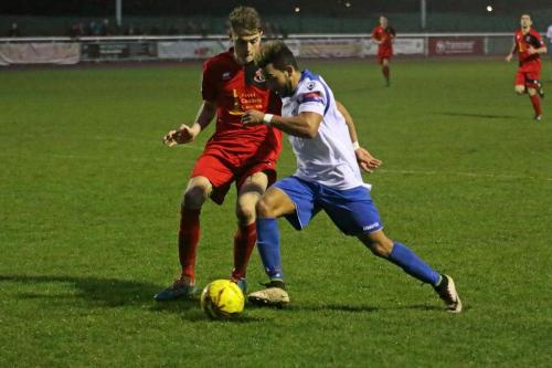 Enfields Tyler Campbell (R) runs at Tyler French