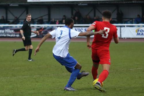 Ricky Gabriel shoots through Aidan Austins legs
