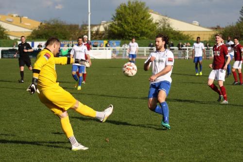 Bognor keeper Dan Lincoln clears from Harry Ottaway