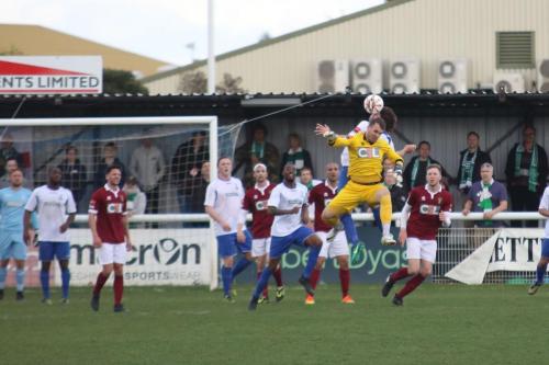 Bognor keeper Dan Lincoln joins the attack for a late set piece but is beaten in the air by Harry Ottaway