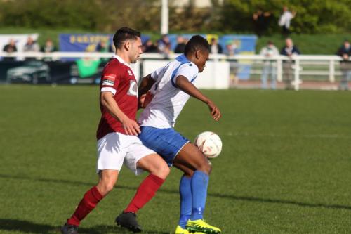 Bognors Alex Parsons (L) and Enfields Karl Oliyide