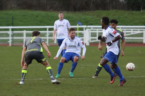 Enfields Billy Crook (white, L) and Bobby Devyne and Havants Wes Fogden (L) and Theo Lewis