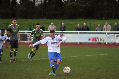 Enfields Billy Crook scores from the penalty spot