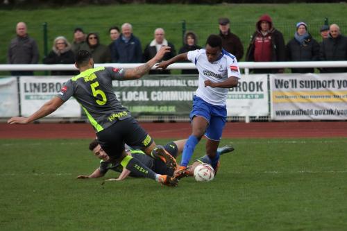 Havants Jordan Rose (5) brings down Karl Oliyide to concede a penalty