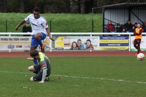 Havants Ryan Woodford (grey) beats Karl Oliyide to the ball