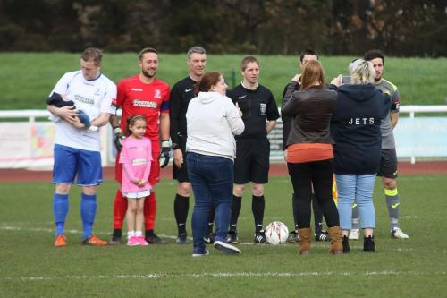 Mark Kirby (L) takes care of the 7-week-old mascot