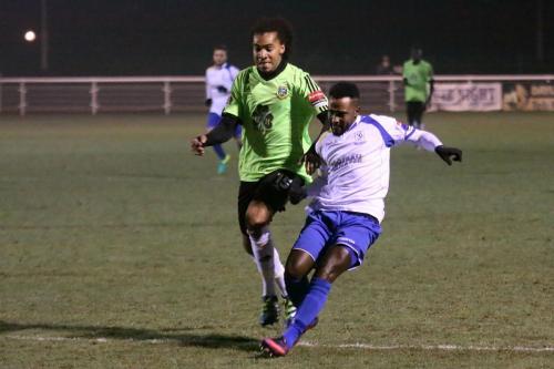 Enfields Bobby Devyne (R) holds off Kezie Ibe but shoots wide