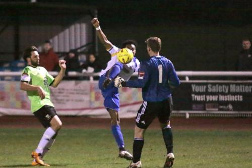 Enfields Dernell Wynter tries to lift the ball over keeper Tom Lovelock