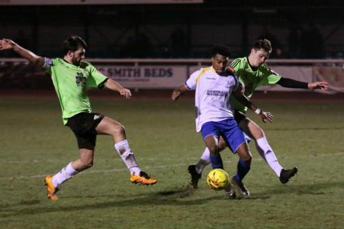 Enfields Dernell Wynter tries to line up a shot under pressure from Casey Maclaren (L) and Jamie Smith