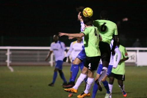 Enfields Harry ottaway challenges by Casey Maclaren (4) and  Dave Diedhiou