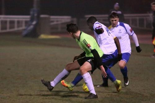 Hendons Jamie Smith and Enfields Percy Kiangebeni and Keir Dickson (R)