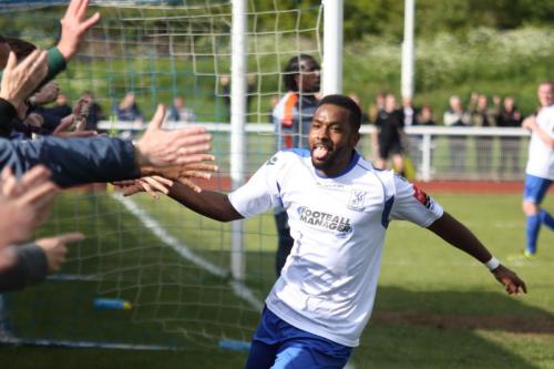 Bobby Devyne celebrates his goal with the Enfield fans