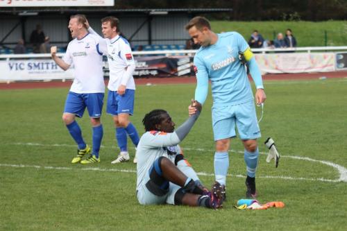 Enfield keeper Nathan McDonald (R) consoles his opposite number Ashlee Jones