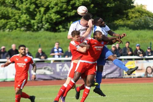 Enfields Harold Joseph (R) and Mark Kirby climb above Niko Muir (red, R) and Tom Bullard