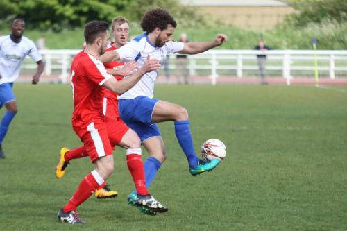 Enfields Harry Ottaway (R) controls the ball under pressure from Joe Jefford
