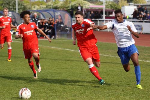 Enfields Karl Oliyide and Leistons Ollie Brown (L) and Jack Ainsley
