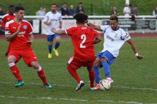 Leistons Ollie Brown (2) challenges Tyler Campbell