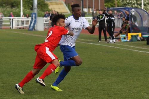 Leistons Ollie Brown (L) and Enfields Karl Oliyide