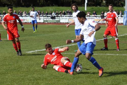 Leistons Tom Bullard (red) challenges Dernell Wynter