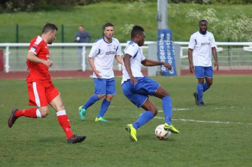 Leistons goalscorer Gareth Heath (red) and (L-R) Enfields Billy Crook, Karl Oliyide and Harold Joseph