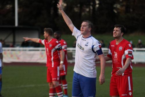 Enfield captain Mark Kirby calls for the ball