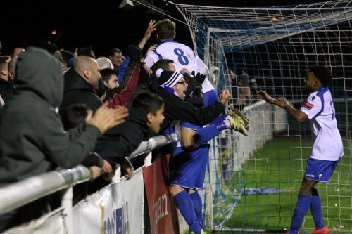 Enfield celebrate the late equalising goal