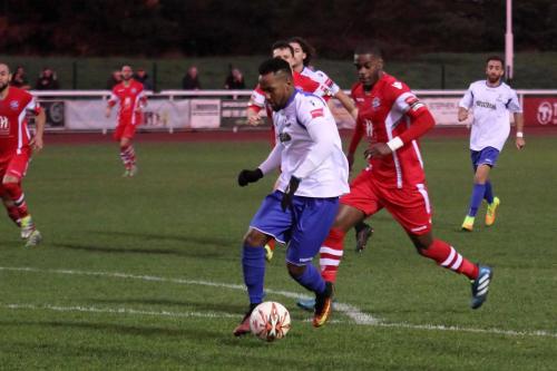 Enfields Bobby Devyne breaks clear of James Folkes