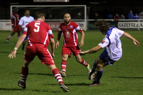 Enfields Harry Ottaway (R) tries to turn away from Sonny Miles (5) and Damien Scannell